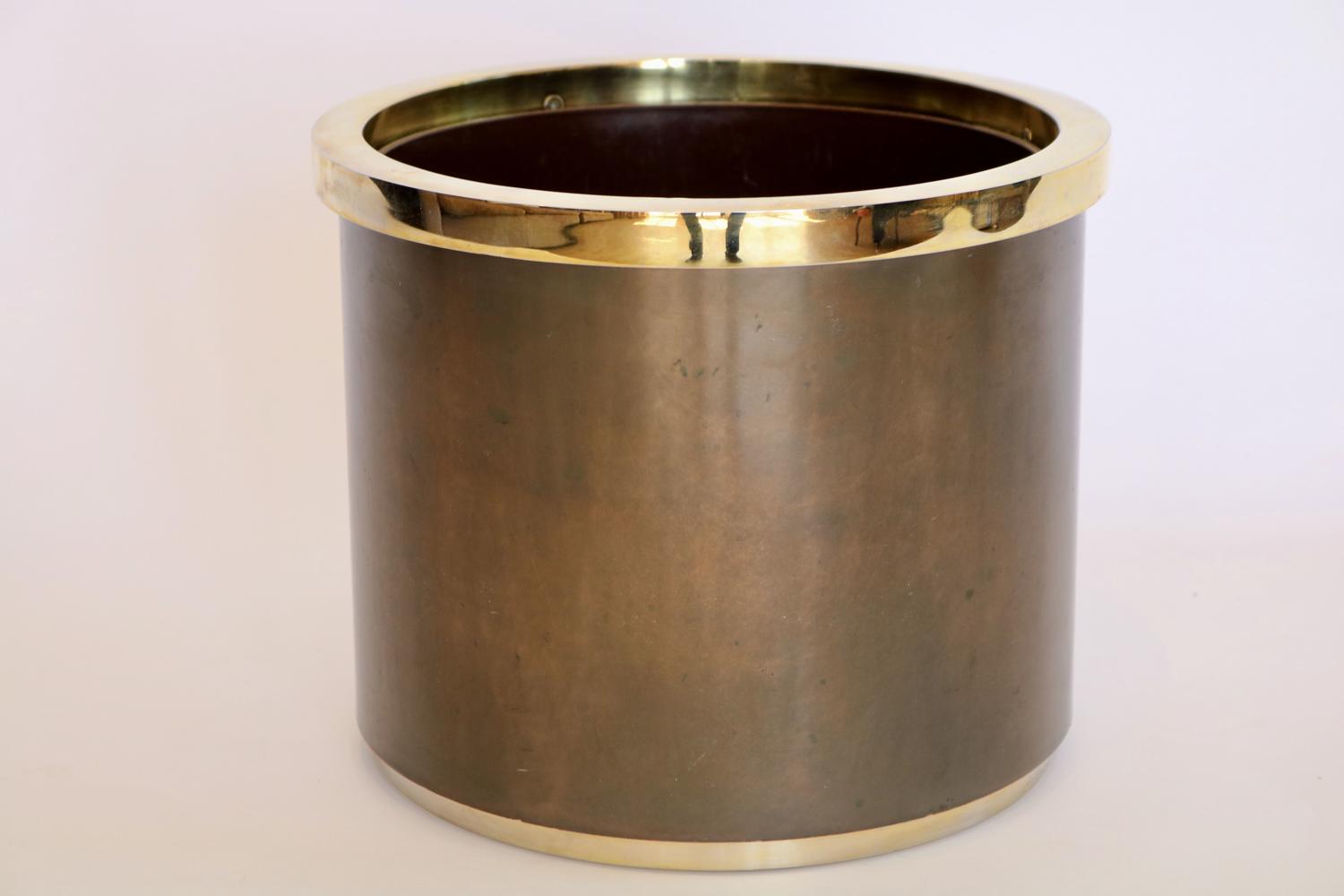 Brass and lacquered metal plant pot holder