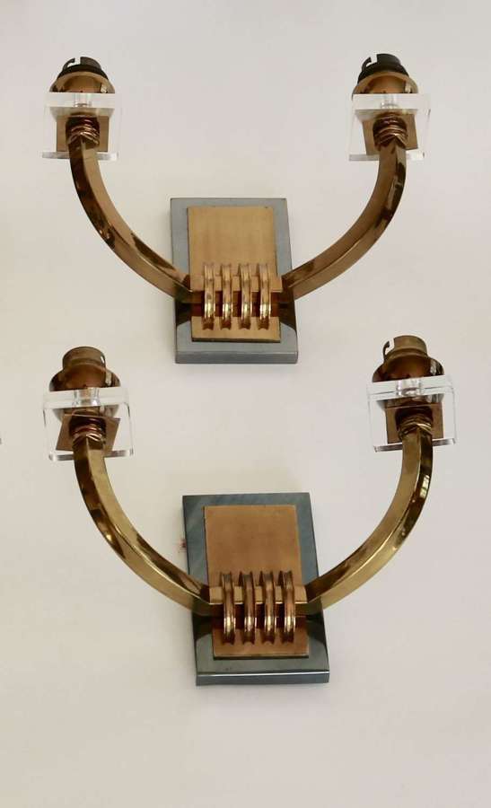 Pair of brass and gunmetal wall lights.  French from the 1950's. Of