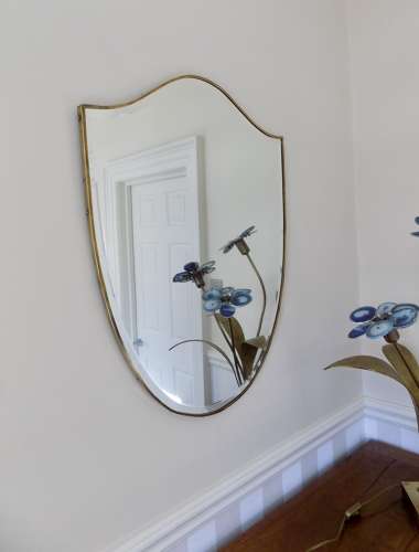 Italian brass shield mirror with bevelled glass